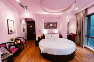Postel nebo postele na pokoji v ubytování A&D Luxury Hotel