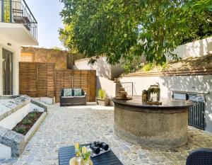 a courtyard with a fountain in a house at Casa de Arouca - Arouca Suítes in Arouca
