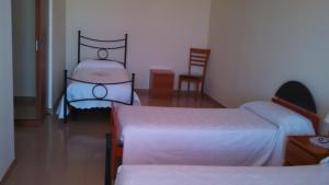Кровать или кровати в номере Joanne B&B