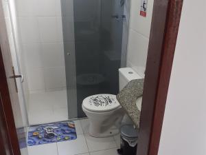 Koupelna v ubytování Apartamento 101 com vista da piscina e mar