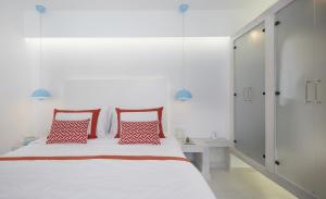 Postel nebo postele na pokoji v ubytování Alta Vista Suites