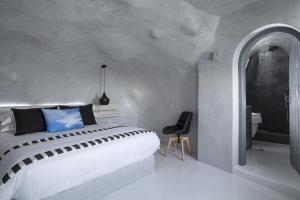 Postel nebo postele na pokoji v ubytování Alta Vista Suites