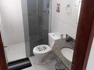 Koupelna v ubytování Apartamento 101 com vista da piscina e mar