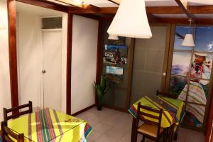 a dining room with a table and two chairs at Sierra Alta Colca in Chivay