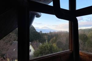 Afbeelding uit fotogalerij van 世界文化遺産の富士山を望むログハウス in Kannami