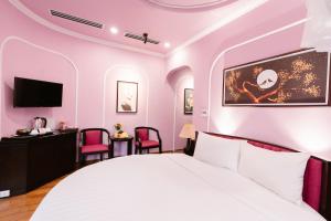 Postel nebo postele na pokoji v ubytování A&D Luxury Hotel
