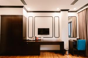 TV a/nebo společenská místnost v ubytování A&D Luxury Hotel