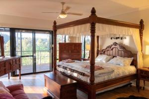 Ένα ή περισσότερα κρεβάτια σε δωμάτιο στο Blue Moon Forest Lodge