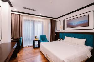 Postel nebo postele na pokoji v ubytování A&D Luxury Hotel