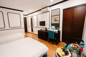 TV a/nebo společenská místnost v ubytování A&D Luxury Hotel