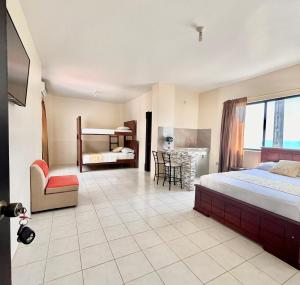 Letto o letti in una camera di HOTEL SUEÑOS BEACH