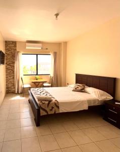 Letto o letti in una camera di HOTEL SUEÑOS BEACH