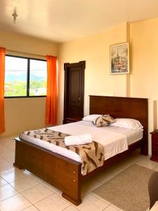 Letto o letti in una camera di HOTEL SUEÑOS BEACH