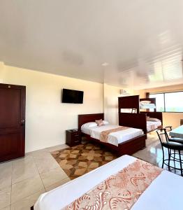 Postel nebo postele na pokoji v ubytování HOTEL SUEÑOS BEACH + 37 fotografií