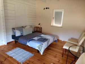 Säng eller sängar i ett rum på Chalet avec vue unique