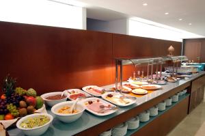 a buffet line with a lot of food on at Hotel Murrieta in Logroño