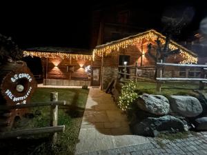 Zahrada ubytování HIBOU Chambres - Cogne
