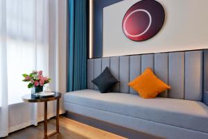 Letto o letti in una camera di Mehood Hotel Hanzhong Central Plaza