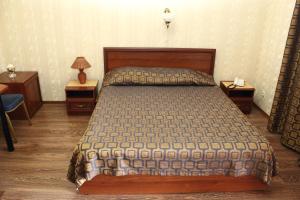 Een bed of bedden in een kamer bij Hotel Complex Park hotel D-grad