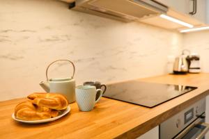 Η κουζίνα ή μικρή κουζίνα στο Laguna Beskidów Resort - Apartament Górska Przystań