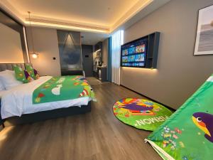 Letto o letti in una camera di Mehood Hotel Hanzhong Central Plaza