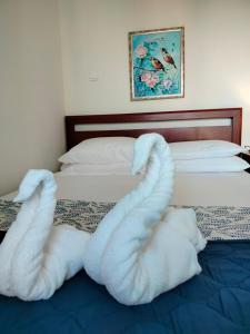 Letto o letti in una camera di Dionysus View