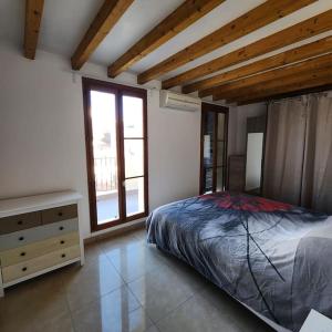 Postel nebo postele na pokoji v ubytování Maison sur les toits confort