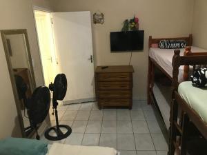 TV a/nebo společenská místnost v ubytování Apartamento beto carreiro , praia