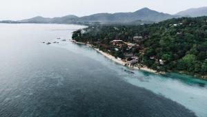 an aerial view of a beach in the water at Siam Cookies Cottage in Haad Pleayleam