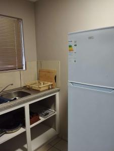 Η κουζίνα ή μικρή κουζίνα στο Hopetown Accommodation