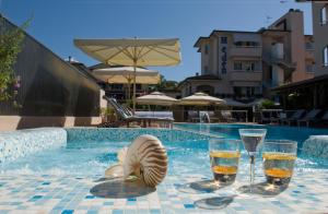 The swimming pool at or close to Hotel Eden