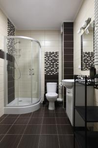 Kúpeľňa v ubytovaní Luxury Apartment Zablocie WiFi Air Conditioning + 15 fotografií