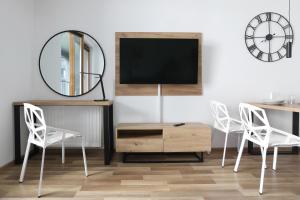 Televízia a/alebo spoločenská miestnosť v ubytovaní Luxury Apartment Zablocie WiFi Air Conditioning