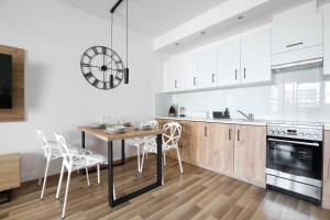 Kuchyňa alebo kuchynka v ubytovaní Luxury Apartment Zablocie WiFi Air Conditioning