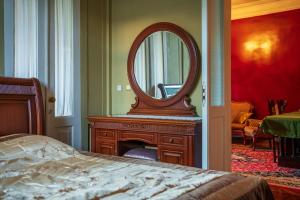 A bed or beds in a room at Vakho house