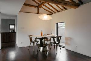 a dining room with a table and chairs at Stay kkachi #center of Hanok village in Jeonju