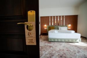Voodi või voodid majutusasutuse Hotel Relax Craiova toas