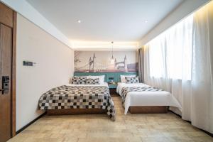 Fotografie z fotogalerie ubytování Mehood Theater Hotel, Jinan Quancheng Plaza Baotu Spring v destinaci Ťi-nan