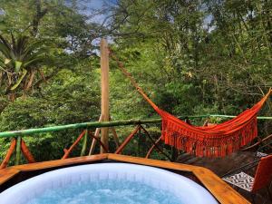 Zahrada ubytování BAUMHAUS Cabañas rusticas con jacuzzi privado + 37 fotografií