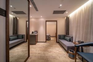 Posezení v ubytování Mehood Theater Hotel, Jinan Quancheng Plaza Baotu Spring + 29 fotografií