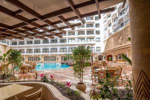Πισίνα στο ή κοντά στο Azal Pyramids Hotel