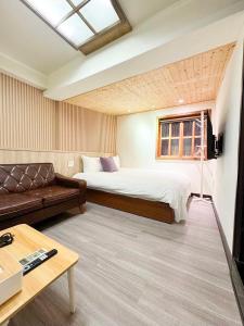 慢步南國 雙包棟民宿 Slow Tainan Entire Home的休息区