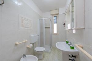 Koupelna v ubytování Carlo