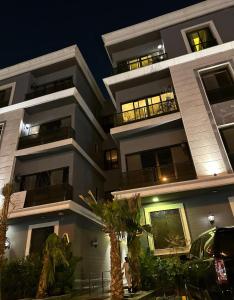 a building with a car parked in front of it at fin apartment C6 in Riyadh