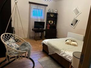 TV a/nebo společenská místnost v ubytování House of Maria
