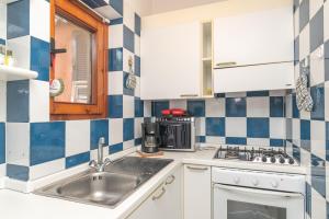 A kitchen or kitchenette at Villa Ari
