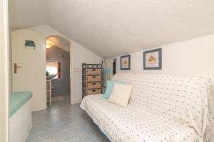 A bed or beds in a room at Villa Ari