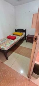 a room with a bed in a room at ASHBURN'S TRANSIENT BAGUIO- Dorm rooms 6th floor in Baguio