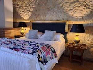 Postel nebo postele na pokoji v ubytování LaChiusa Tuscany