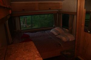 Postel nebo postele na pokoji v ubytování Caravan Yard